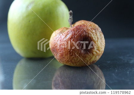 apple ugly spoiled and beautiful good on a black background copyspace apple ugly spoiled and beautiful good on a black background copyspace 119578962
