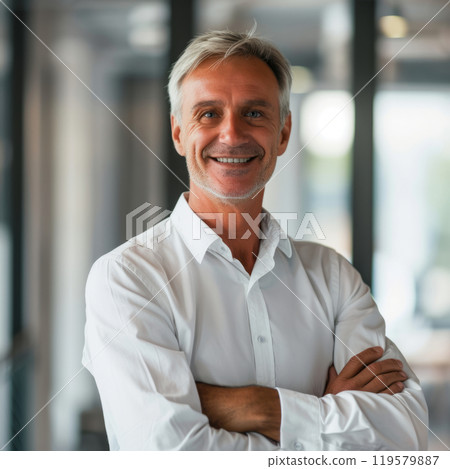 Portrait of a European businessman 50-60 years against the background of an office 119579887