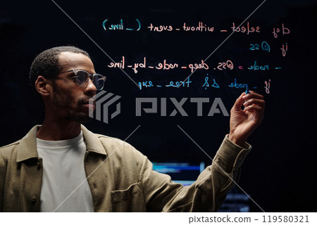 Writing Lines of Code on Transparent Board Writing Lines of Code on Transparent Board 119580321
