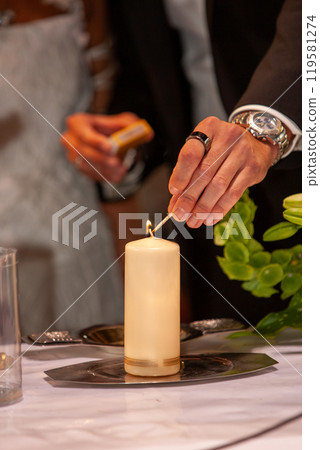 An exquisite Ceremony Candle Lighting event featuring a beautifully elegant table setting An exquisite Ceremony Candle Lighting event featuring a beautifully elegant table setting 119581274