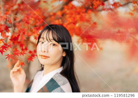 Autumn leaves and women Autumn leaves and women 119581296