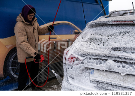 SUV Being Washed at Car Wash 119581337