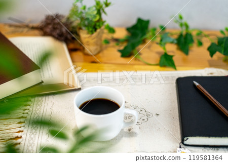 Coffee and books on the table Coffee and books on the table 119581364