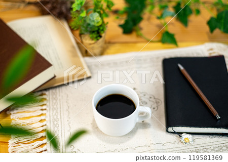 Coffee and books on the table 119581369