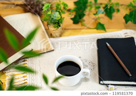 Coffee and books on the table Coffee and books on the table 119581370