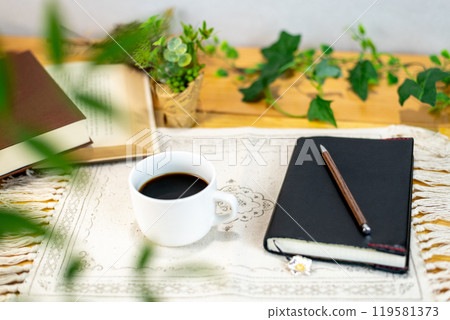 Coffee and books on the table 119581373