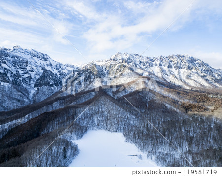 Kagamiike Pond and the Togakushi mountain range in winter (drone aerial photography) Togakushi, Nagano City, Nagano Prefecture 119581719