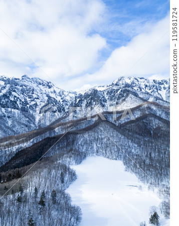 Kagamiike Pond and the Togakushi mountain range in winter (drone aerial photography) Togakushi, Nagano City, Nagano Prefecture 119581724