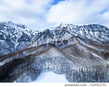 Kagamiike Pond and the Togakushi mountain range in winter (drone aerial photography) Togakushi, Nagano City, Nagano Prefecture 119581731