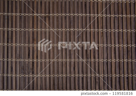 Dark old bamboo mat texture or background 119581816