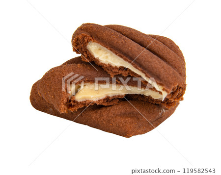 Chocolate cookie with cream filling isolated on the white background Chocolate cookie with cream filling isolated on the white background 119582543