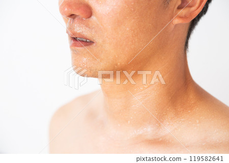 Sweaty naked middle-aged man 119582641