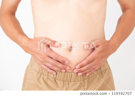 Middle-aged man's belly 119582707