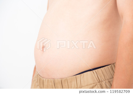 Middle-aged man's belly Middle-aged man's belly 119582709
