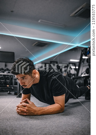 Man doing core training at the gym 119583775