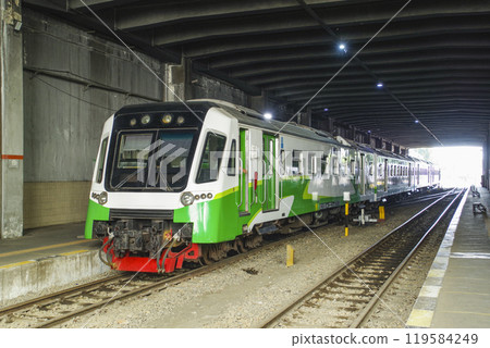 A suburban train arriving at Surabaya Kota Station A suburban train arriving at Surabaya Kota Station 119584249