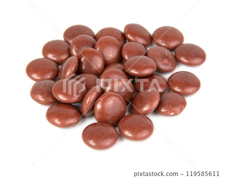 dragee drops chocolate glazed isolated on the white background dragee drops chocolate glazed isolated on the white background 119585611