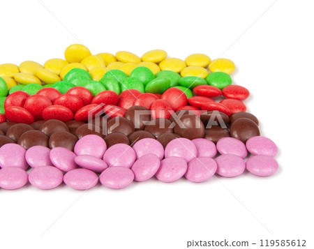 Multicolor dragee drops chocolate glazed isolated on the white background Multicolor dragee drops chocolate glazed isolated on the white background 119585612