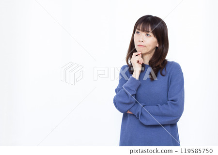 A woman who is worried 119585750