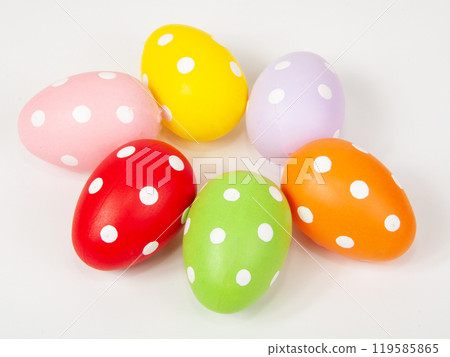 Multicolored easter eggs in dots on the white background Multicolored easter eggs in dots on the white background 119585865