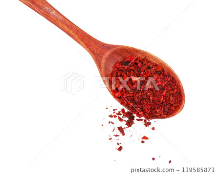 Dried tomato and paprika spice in wooden spoon isolated on the white background Dried tomato and paprika spice in wooden spoon isolated on the white background 119585871