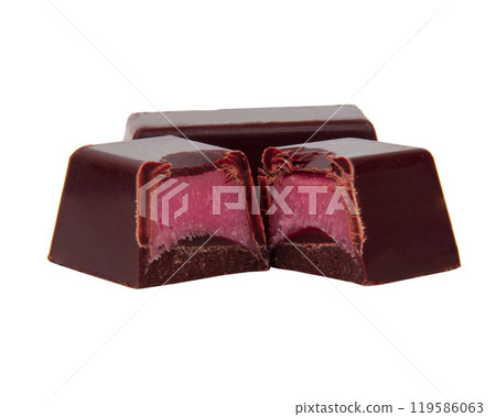 Chocolate sweets with pink strawberry filling praline isolated on the white Chocolate sweets with pink strawberry filling praline isolated on the white 119586063
