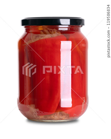 Red bell peppers stuffed with German sauerkraut, pickled in a glass jar with screw cap. Sweet peppers filled with fermented cabbage, preserved in a brine of vinegar and salt. A barbecue side dish. 119586834