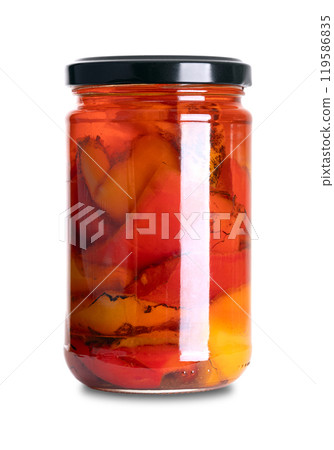 Grilled red and yellow bell peppers, preserved in sunflower oil and vinegar, in a glass jar with screw cap. Cut sweet peppers, roasted, salted and flavored with garlic. Garnish and barbecue side dish. 119586835