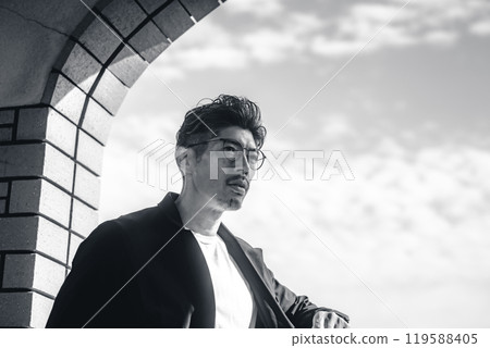 Stylish man with glasses Stylish man with glasses 119588405