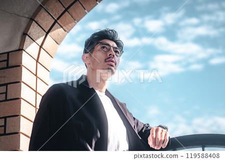 Stylish man with glasses Stylish man with glasses 119588408