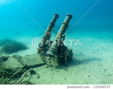 Two old cannons as a part of an artificial reef in the Adriatic Sea. Beautiful turquoise water 119588537