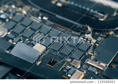 A detailed image of a circuit board showcasing various microchips and electronic components used in devices 119588561