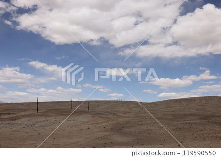 Wooden electric pole in the Pamir Mountains 119590550