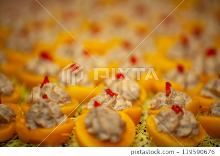 Deliciously crafted Mini Desserts featuring Cream and Peaches for all occasions and tastes Deliciously crafted Mini Desserts featuring Cream and Peaches for all occasions and tastes 119590676