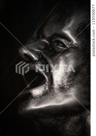 A captivating emotive bronze sculpture that beautifully captures raw and intense human emotion 119590677