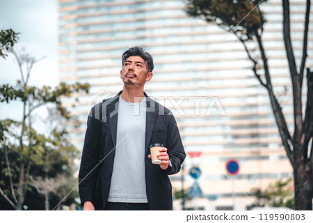 A man commuting through an office district A man commuting through an office district 119590803
