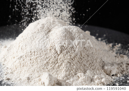 Texture of Natural Organic Whole Wheat Flour on Black Background. 119591040