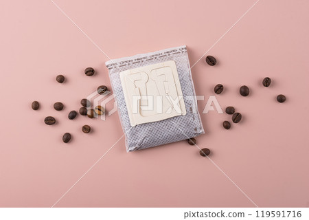 Close-up of drip coffee paper bag Close-up of drip coffee paper bag 119591716
