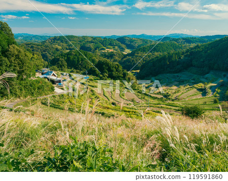 Autumn scenery of rural Japan seen from the top of a mountain: Kamimomi rice terraces, Okayama Prefecture Autumn scenery of rural Japan seen from the top of a mountain: Kamimomi rice terraces, Okayama Prefecture 119591860
