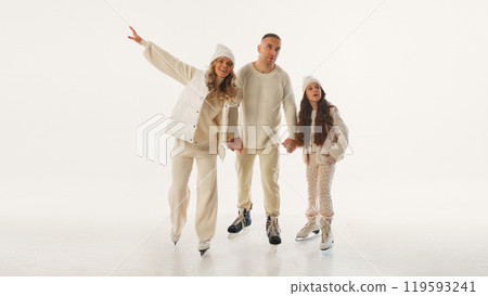 Family enjoys ice skating together, with mom, dad, and daughter holding hands, soaking in winter holiday spirit against white background. Family enjoys ice skating together, with mom, dad, and daughter holding hands, soaking in winter holiday spirit against white background. 119593241