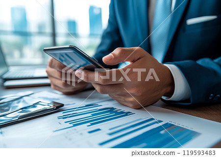 Businessman using smartphone, assessment of the company's assets and liabilities. 119593483