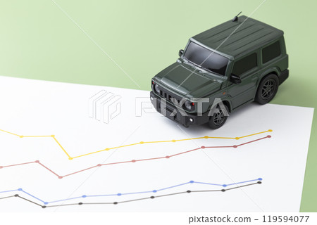 Cars and graphs on green background Cars and graphs on green background 119594077