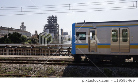 Showa Denko plant and JR Tsurumi Line train seen from the sidewalk of Ogibashi (Kawasaki City) Showa Denko plant and JR Tsurumi Line train seen from the sidewalk of Ogibashi (Kawasaki City) 119595469