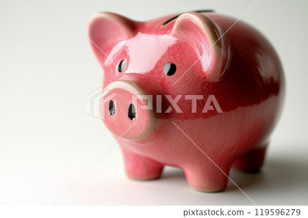 A close view of a pink ceramic piggy bank on a white background at home 119596279