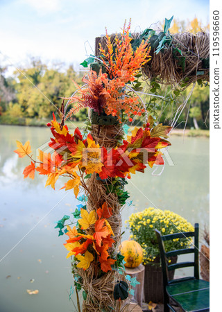 Autumn Halloween pumpkin decorations in a park background 119596660