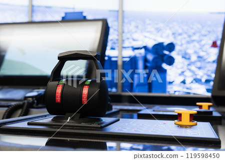 Ship control panel with an engine accelerator and digital screens, close up photo Ship control panel with an engine accelerator and digital screens, close up photo 119598450