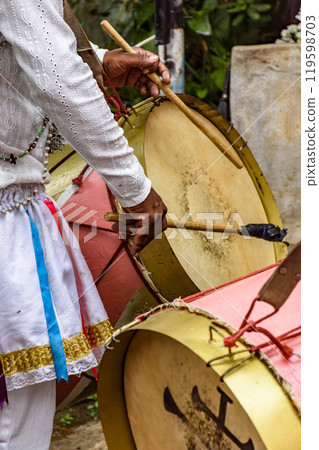 Musicians with colorful drums 119598703