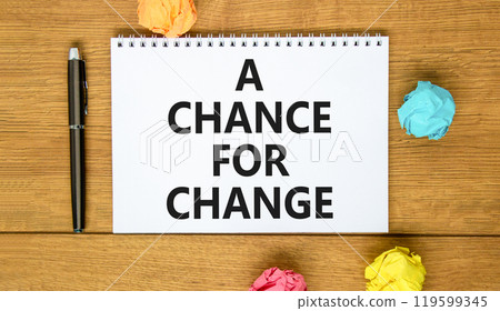 A chance for change symbol. Concept words A chance for change on beautiful white note. Beautiful wooden table background. Colored paper. Black pen. Business A chance for change concept. Copy space. A chance for change symbol. Concept words A chance for change on beautiful white note. Beautiful wooden table background. Colored paper. Black pen. Business A chance for change concept. Copy space. 119599345
