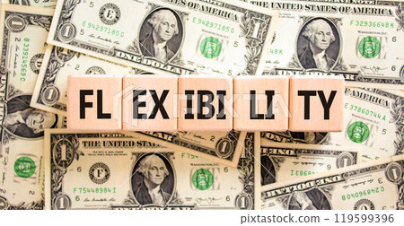 Flexibility symbol. Concept word Flexibility on beautiful wooden blocks. Dollar bills. Beautiful background from dollar bills. Business flexibility concept. Copy space. Flexibility symbol. Concept word Flexibility on beautiful wooden blocks. Dollar bills. Beautiful background from dollar bills. Business flexibility concept. Copy space. 119599396