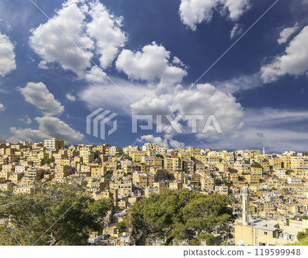 Amman city landmarks-- old roman Citadel Hill, Jordan. Against the background of a beautiful sky with clouds 119599948